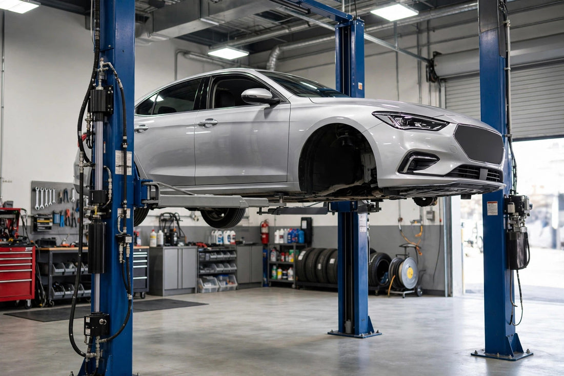 Two-post vehicle lift in an auto repair shop for vehicle lift troubleshooting