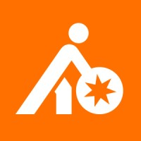 White icon of a person with an arrow and a star on an orange background